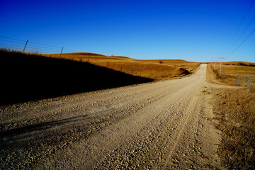 Fototapeta na wymiar dirt road in the Flint Hills prairie in Kansas