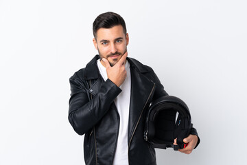 Fototapeta premium Man with a motorcycle helmet thinking an idea