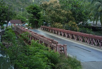 Old bridge with rusty railings in a backroad in Oklahoma