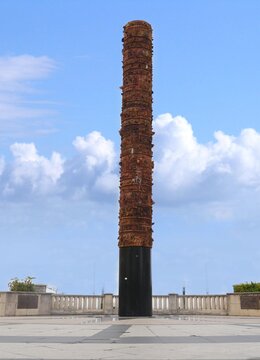 Full image of the Totem Telurico or totem pole at the Quincentennial plaza of the Old San Juan section designed by Puerto Rican artist Jaime Suarez.