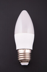 Electric bulb of LED. White on a black background.