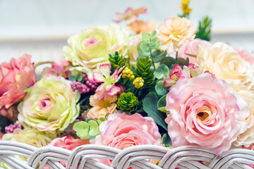 Bouquet of artificial pink roses close-up. Selective focus