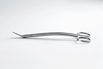 durable metal surgical scissors for suturing black on a white background