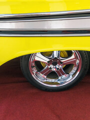 A wheel of a vintage car