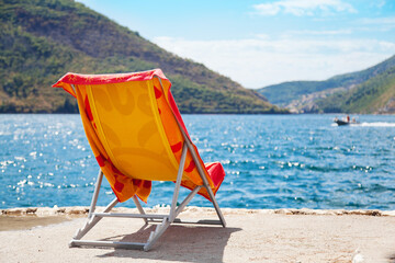 Colorful chaise longue by the Kotor Bay in Perast, Montenegro