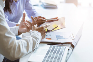 Business team discussing together in conference room during meeting at office. Teamwork, brainstorm and ideas concept.