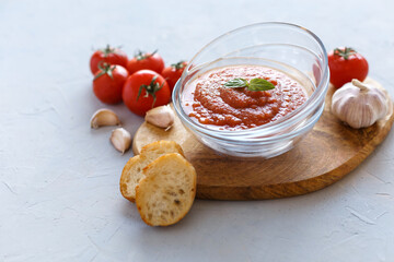 A bowl of fresh gazpacho. Cold tomato soup.