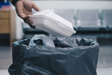 Throw the foam box into the trash.