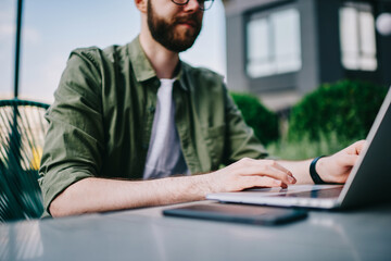 Smart man learning online using new modern laptop computer