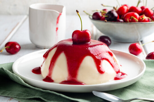  Close Up Of Italian Panna Cotta Dessert With Cherry Coulis