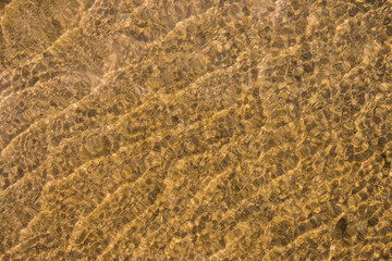 
sandy shallow water at sea, sandy bottom