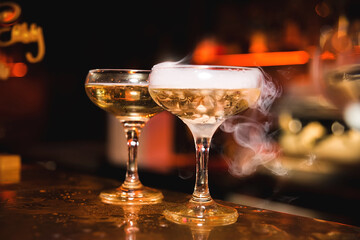 Cocktail with smoke in the night club, night life. alcohol