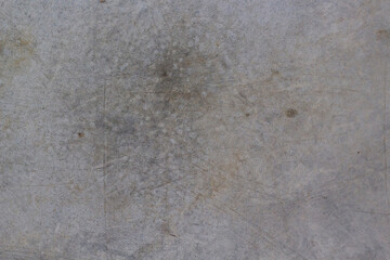 Concrete background with scratches. Gray cement floor or textured wall. Copy space