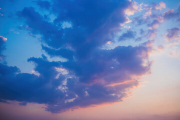 Naklejka na ściany i meble sunset purple clouds with shades of blue and orange, beautiful sky at sunset