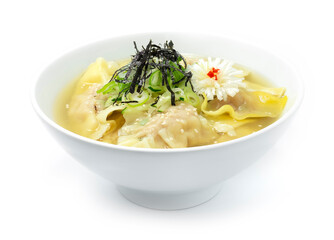 Dumpling Soup (Mundu Guk) ontop cucumber Cutlet, Spring onions,Seaweed and sesame Korean Food