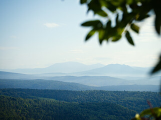 Mountain horizon. Bright and colorful landscape of a high mountain in a haze.
