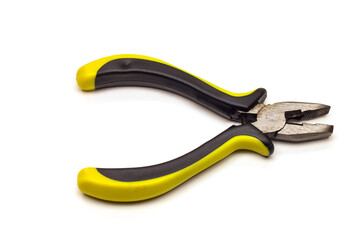 small pliers with yellow-black handles, on a white background, isolated