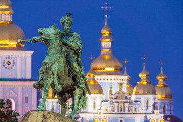Fototapeta na wymiar Bohdan Khmelnytsky Monument with St. Michael's Golden-Domed Monastery on the background in Kyiv, Ukraine