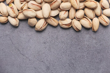 high angle view of pistachios nut on gray background 