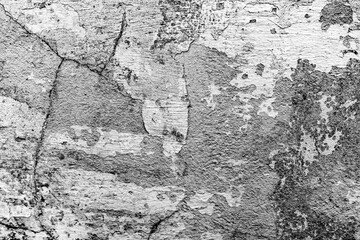 Texture of a concrete wall with cracks and scratches which can be used as a background
