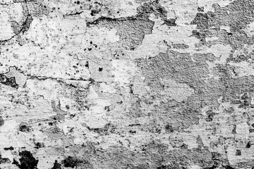 Texture of a concrete wall with cracks and scratches which can be used as a background