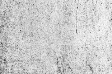 Texture of a concrete wall with cracks and scratches which can be used as a background