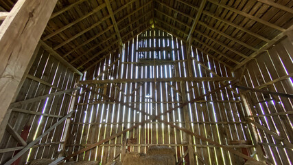 old barn and barnyard filled with collectables old cars