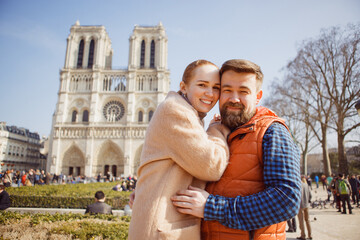 couple walking in spring Paris. romantic trip together. tourism in Europe.