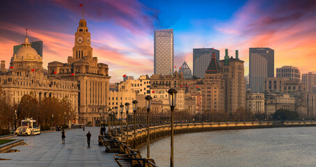 Shanghai The Bund historical old colonial buildings, Shanghai city skyline and skyscraper, sunrise on The Bund, China.