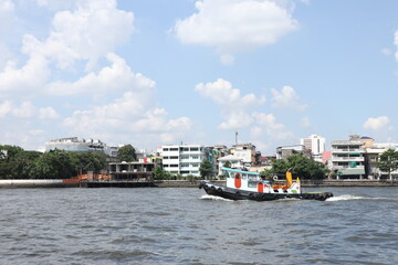 river thames in Bangkok. boat for transporting workers on the Chao Phraya River.