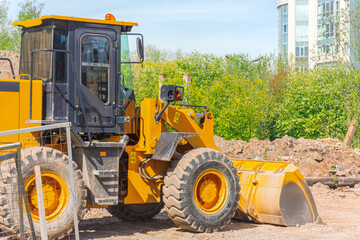 Yellow bulldozer with bucket, heavy Equipment Machine.