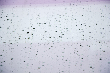 Rain drops on the glass background