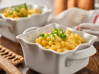 macaroni and cheese in dish with scallions