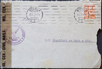 GERMANY - CIRCA 1947: Envelope with a postal stamp, which was stamped  by the US Civil Censorship  Germany passed 205585 and with a glue banderole. The letter went from Bremen to Frankfurt