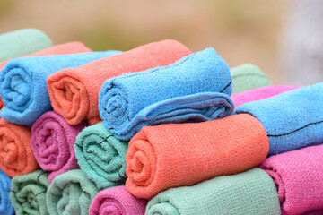 Colorful towels arranged in a row