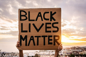 Black lives matter banner - Activist movement protesting against racism and fighting for equality -...