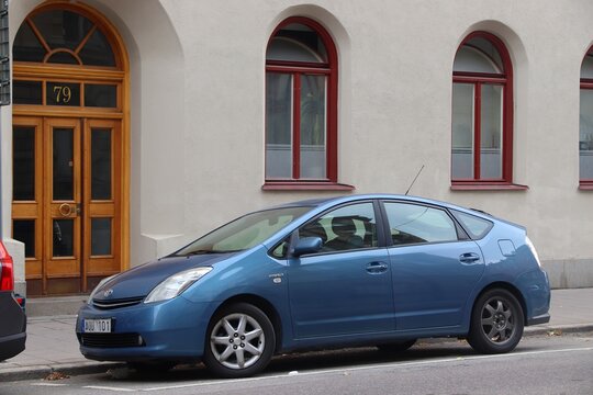 STOCKHOLM, SWEDEN - AUGUST 24, 2018: Blue Toyota Prius hybrid compact car parked in Stockholm, Sweden. There are 4.8 million passenger cars registered in Sweden.