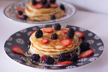 Homemade pancakes with blackberries and strawberries