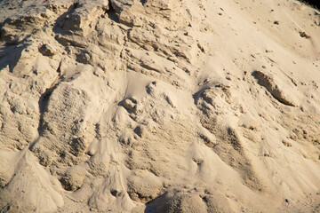 a sand hill looks like mountains from an airplane's high altitude.