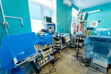 Medical devices, interior hospital design concept. Interior of operating room in modern clinic, screen with tests. closeup