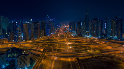 Panoramic aerial view of empty streets due to the coronavirus pandemic in Dubai during the night, United Arab Emirates