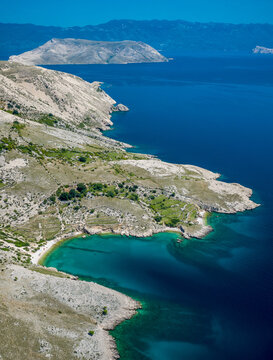 Aerial view of Zala Beach with turquoise water in Stara Baska, Croatia
