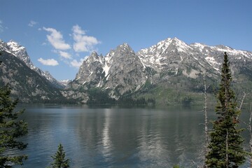 Mountain lake with Grand Tetons in background