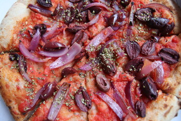 Vegetable italian pizza with olives and onion on tomato sauce