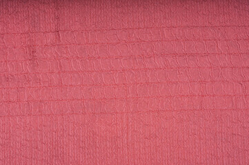 Embossed silk pink fabric texture. Pastel background