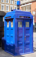 Fototapeta premium Police public call box outside Earl's Court tube station in London, UK.