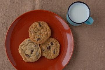 plates of succulent cookies with cup of milk - 2