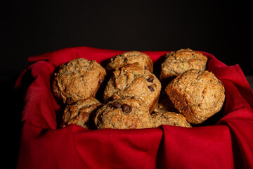 luscious chocolate and zucchini muffin in a red basket