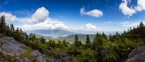 Beautiful Panoramic Canadian Landscape view from top of Mt. Gardener Hike with Vancouver City in Background. Located in Bowen Island, British Columbia, Canada.