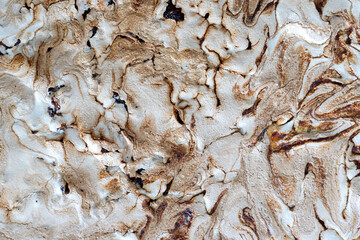 Marble texture of home-made crumble cake with strawberry jam covered with meringue. Streuselkuchen, cake background, top view